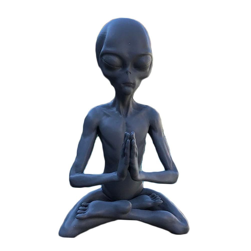 Meditating extraterrestrial garden sculpture by Everything Baby, outdoor lawn decor for home or garden, whimsical alien figurine.