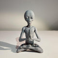 Meditating extraterrestrial garden art sculpture by Everything Baby, suitable for indoor or outdoor garden and lawn decor.