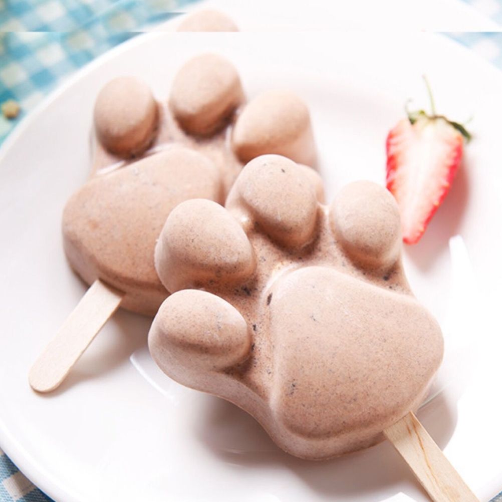Silicone heart-shaped and paw ice cream mold for making homemade popsicles, cakes, and jellies for kids by Everything Baby.