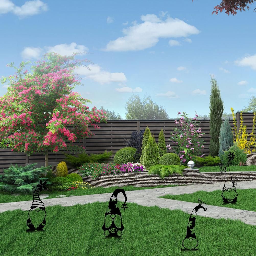 Cute outdoor garden metal statue of a standing goblin, decorative iron art for yard and garden decor.