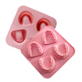 Teeth-shaped silicone ice cube tray by Everything Baby, fun denture ice mold for parties and gag gifts