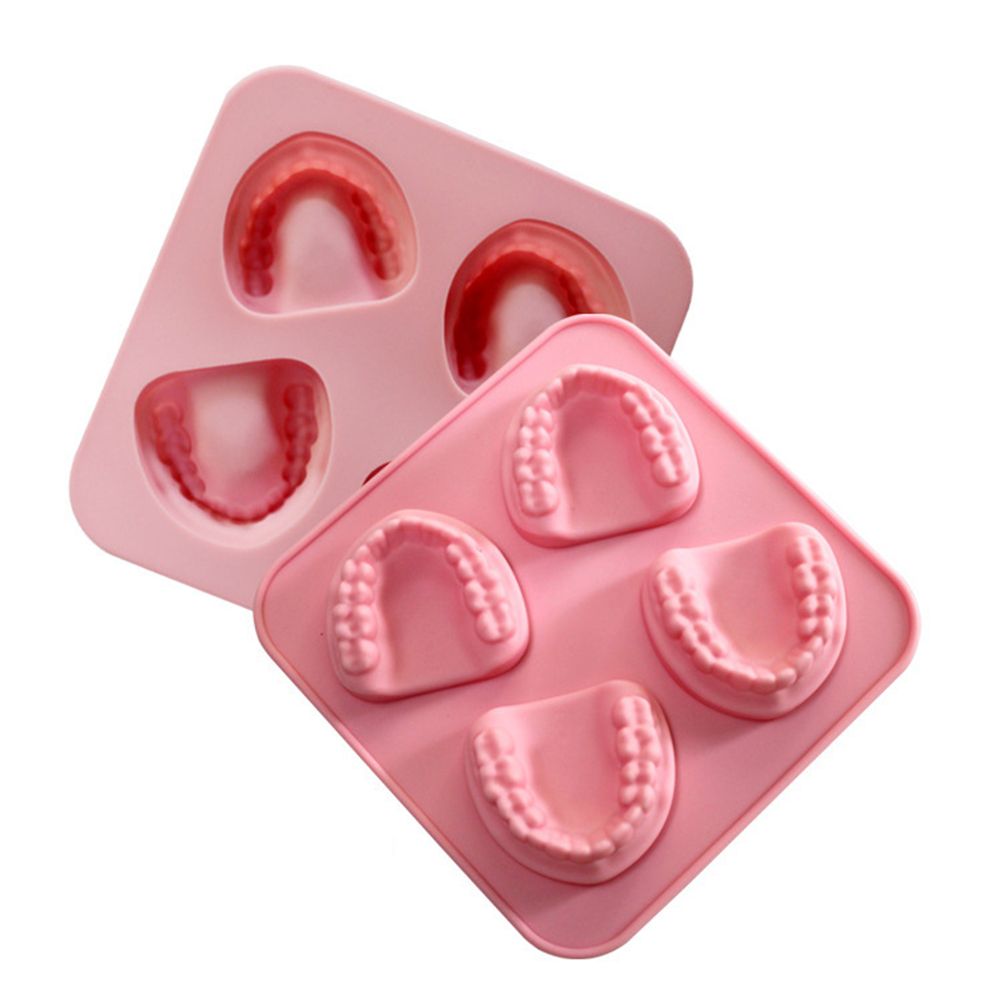 Teeth-shaped silicone ice cube tray by Everything Baby, fun denture ice mold for parties and gag gifts