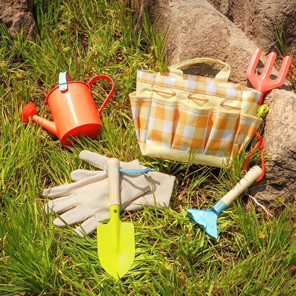 Children's garden tool set with colorful shovels and rakes in a carrying bag, designed for outdoor play and gardening fun.