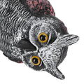 Plastic owl statue decoration for outdoor gardens, used as a bird repeller and hunting decoy in outdoor play and garden settings.