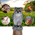 Plastic owl garden decoy statue for outdoor decoration and pest repellent, resembling a real owl to scare away pests.