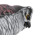 Plastic owl garden decoy for outdoor pest control, resembling a realistic owl to deter birds and pests in outdoor spaces.