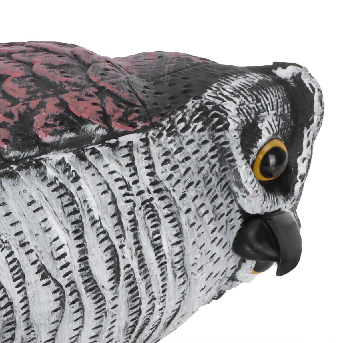 Plastic owl garden decoy for outdoor pest control, resembling a realistic owl to deter birds and pests in outdoor spaces.