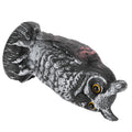 Plastic owl statue decoration for outdoor gardens, used as a bird repeller and hunting decoy, suitable for outdoor play settings.
