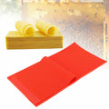 Two red beeswax sheet DIY foundation press molds for beekeeping, with rubber comb and beeswax foundation in a beekeeping accessory kit.