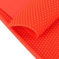 Two red beeswax sheet DIY foundation press molds for beekeeping, with rubber comb shape, used for honey bee hive foundation.