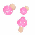 Set of three cute pink mushroom wooden ornaments for home or desk decoration, ideal for kids' crafts and playful decor.