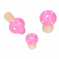 Set of three pink mushroom wooden ornaments for home or office decor, designed as cute building toys for kids by Everything Baby.