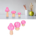 Set of three pink wooden mushroom ornaments from Everything Baby, cute decorative toys for home or office decor.