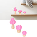 Set of three pink wooden mushroom ornaments for home and office decor, featuring cute, innovative craft design by Everything Baby.