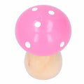 Set of three pink mushroom wooden ornaments for kids' decor, featuring cute, handcrafted design for home or office decoration.