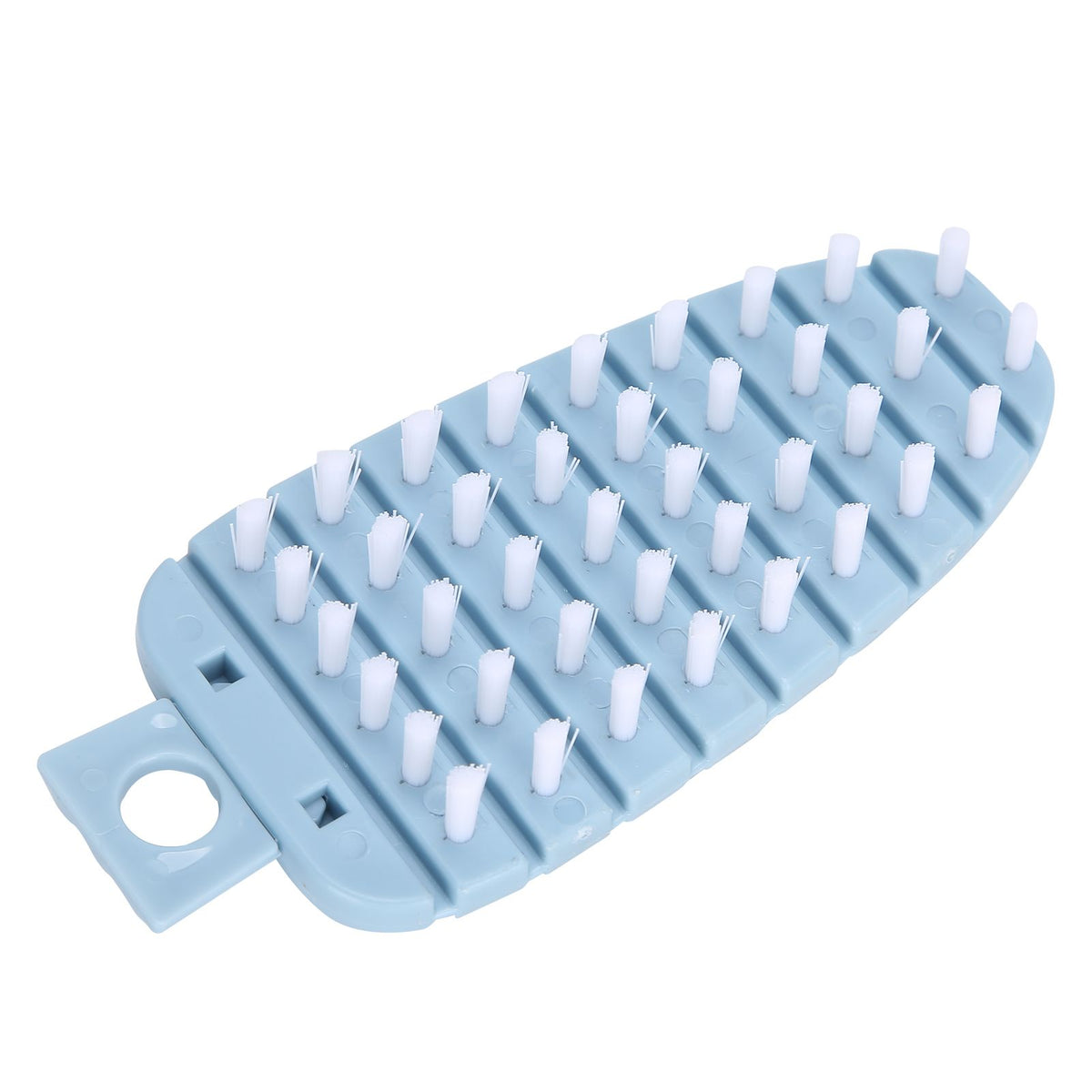 Blue carrot-shaped vegetable brush for scrubbing potatoes, fruits, and vegetables in the kitchen, designed for easy cleaning.
