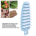 Blue carrot-shaped vegetable brush for cleaning potatoes, fruits, and vegetables, ideal for kitchen scrubbing and food prep.