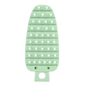 Green carrot-shaped vegetable brush from Everything Baby, designed for scrubbing potatoes, fruits, and vegetables in the kitchen.