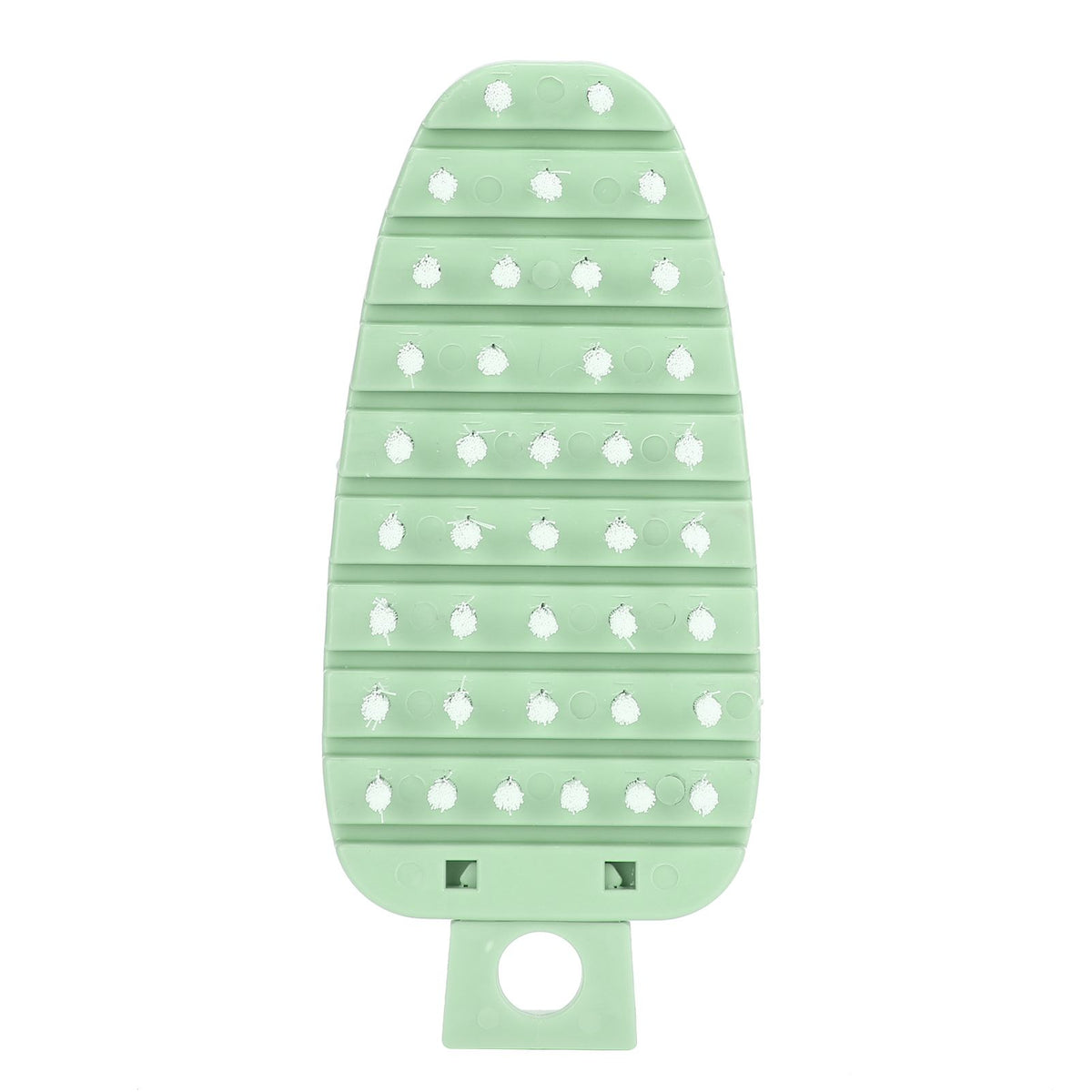 Green carrot-shaped vegetable brush from Everything Baby, designed for scrubbing potatoes, fruits, and vegetables in the kitchen.