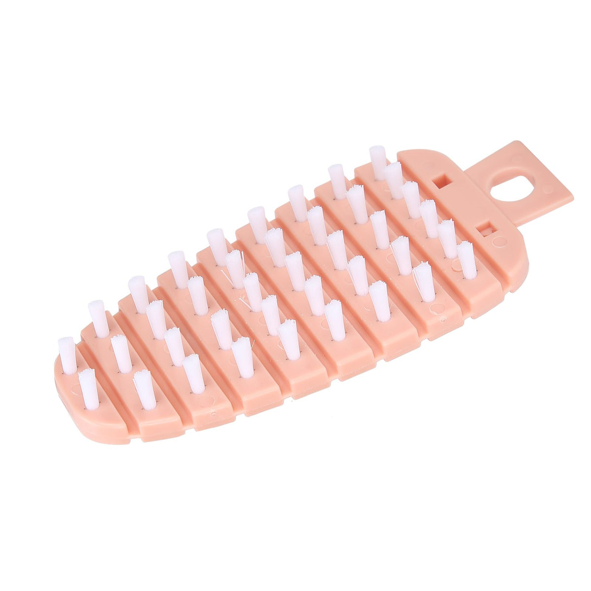 Pink carrot-shaped vegetable and fruit scrubber for kitchen cleaning, ideal for baby and kids feeding utensils from Everything Baby.