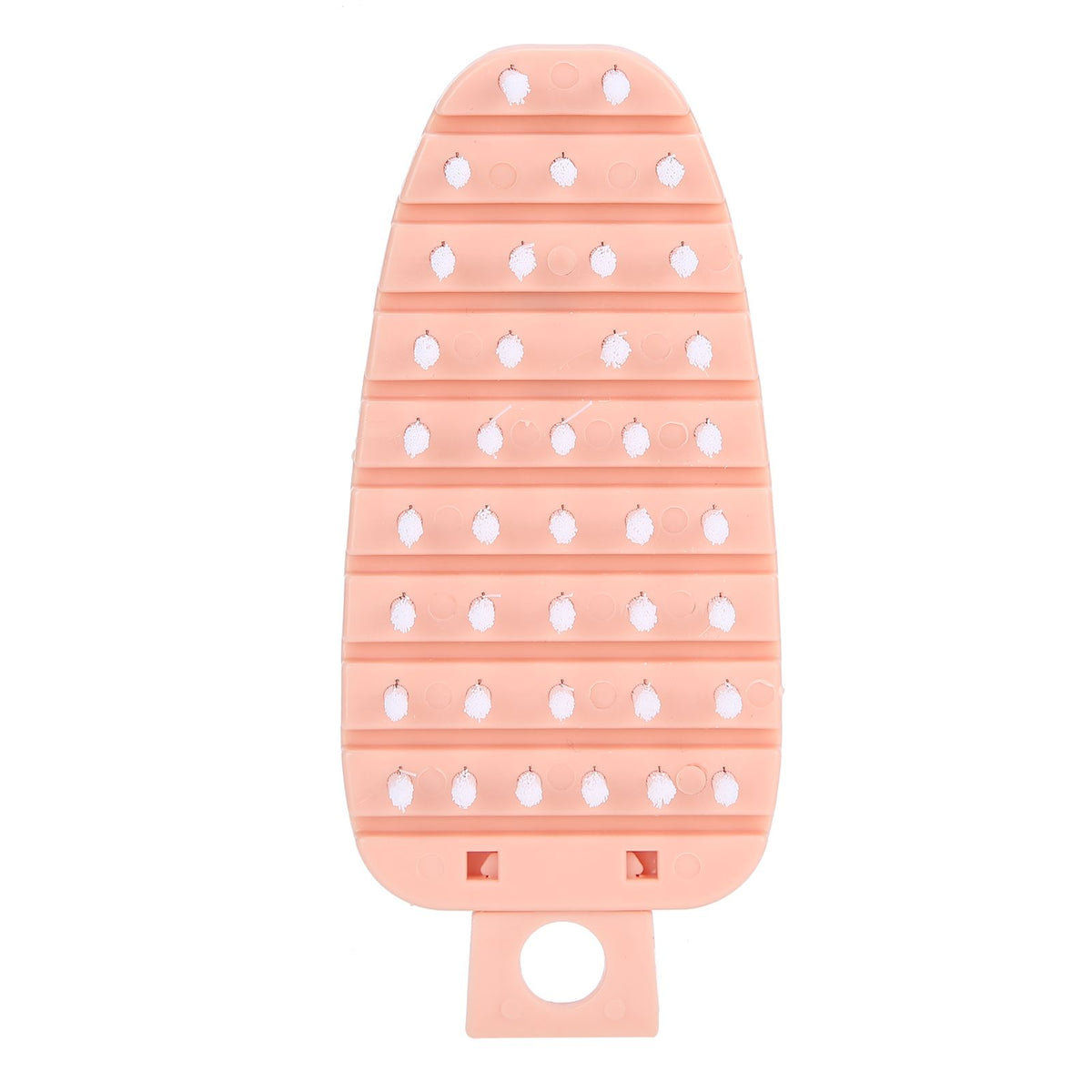 Pink carrot-shaped vegetable brush and potato scrubber, perfect for cleaning fruits and vegetables in the kitchen.