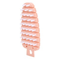 Pink carrot-shaped vegetable and fruit scrubber brush for kitchen cleaning, ideal for baby and kids feeding accessories.