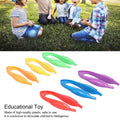 Six plastic tweezers with colorful handles for outdoor exploration and observation, designed for children's educational outdoor play.