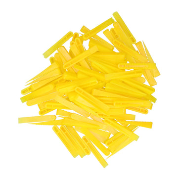 Set of 100 ceramic tile leveling wedges from Everything Baby, used for floor construction and tile installation.