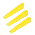 Set of 100 ceramic tile leveling wedges and spacers for floor construction, ideal for precise tile installation and leveling.