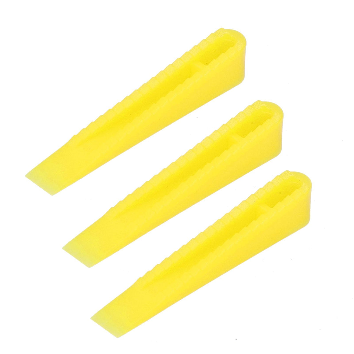 Set of 100 ceramic tile leveling wedges and spacers for floor construction, ideal for precise tile installation and leveling.