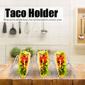 Stainless steel taco holder tray from Everything Baby, designed for kitchen or restaurant use with a 3/4 grid for serving tacos.