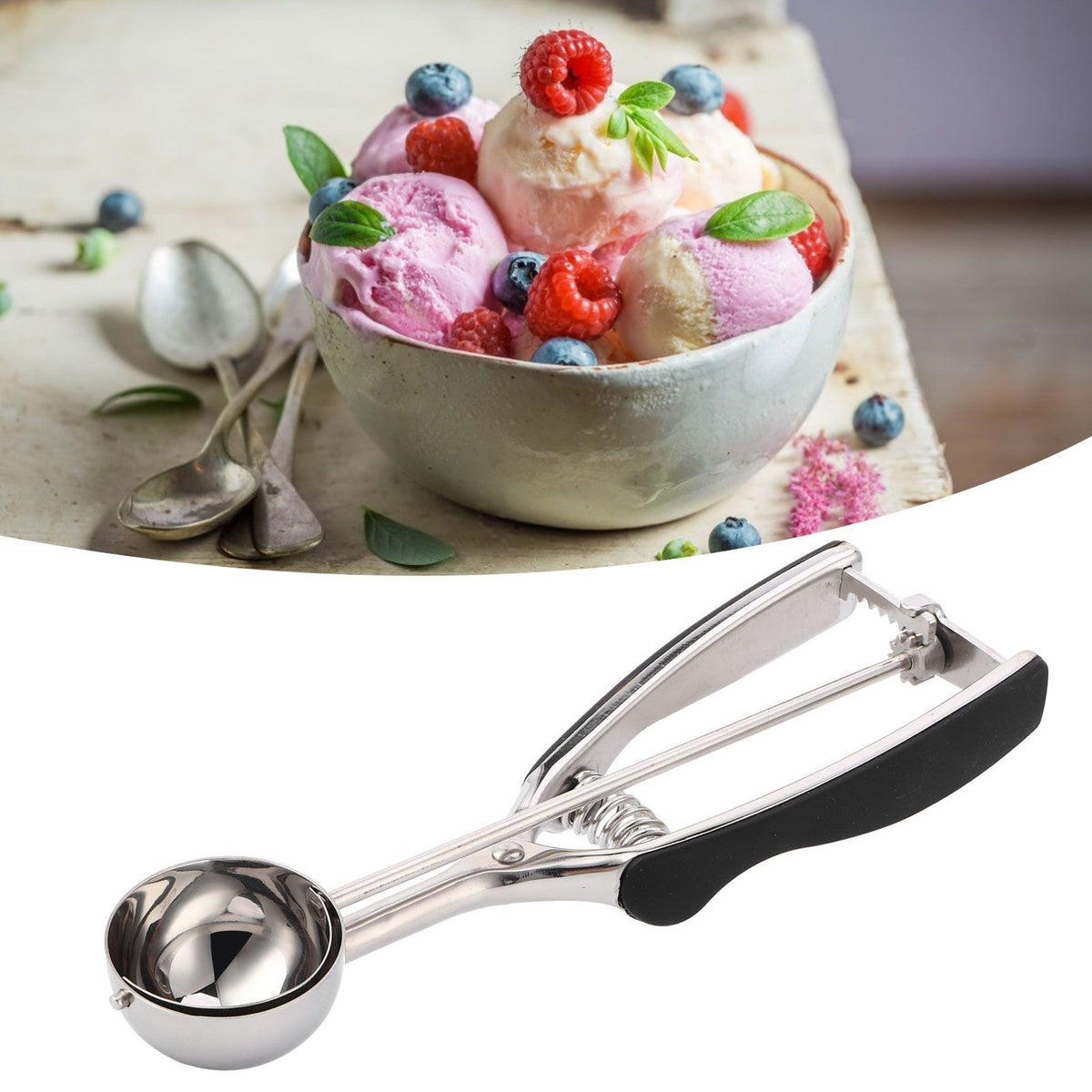 Stainless steel ice cream spoon and melon baller from Everything Baby, perfect for scooping ice cream and fruit balls.