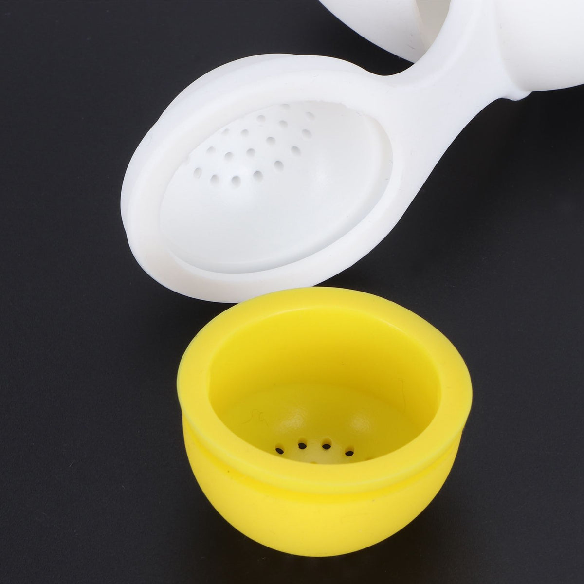 Cute egg-shaped silicone tea infuser strainer for loose leaf tea, ideal for kitchen use and tea brewing.