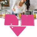 Rose red 3-piece cake cream scraper set with irregular teeth edges, ideal for smooth icing and cake decorating DIY projects.
