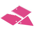 Rose red 3-piece cake scraper set with irregular teeth edges for smooth finishing and decorating, ideal for baking projects.
