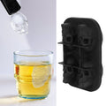 Silicone skull-shaped ice tray with two funnels from Everything Baby, suitable for Halloween treats and fun kitchen use.