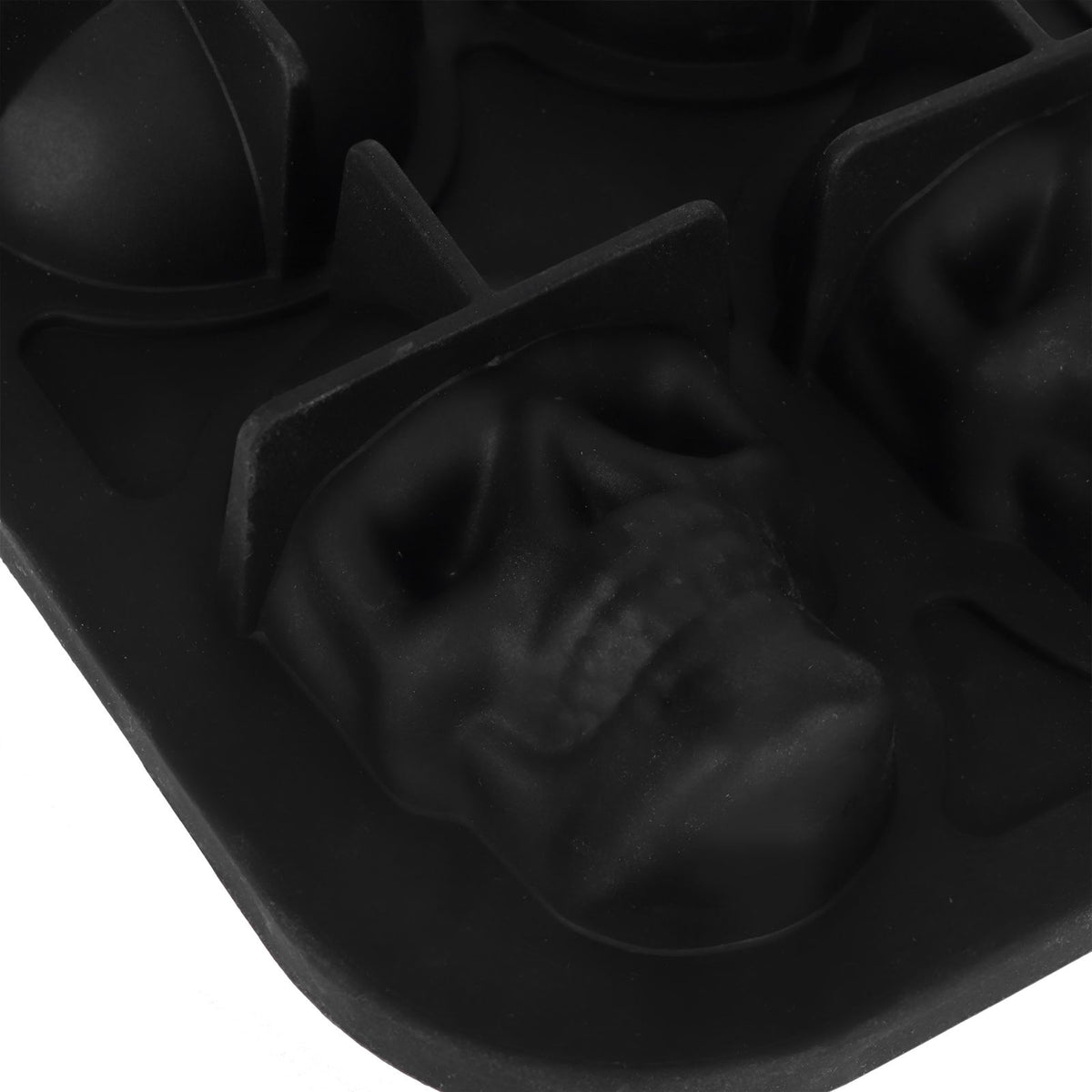 Silicone skull-shaped ice tray with two funnels, ideal for Halloween-themed ice cubes or fun kitchen use.