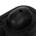 Silicone skull-shaped ice tray with two funnels, suitable for Halloween treats, in a kitchen setting.