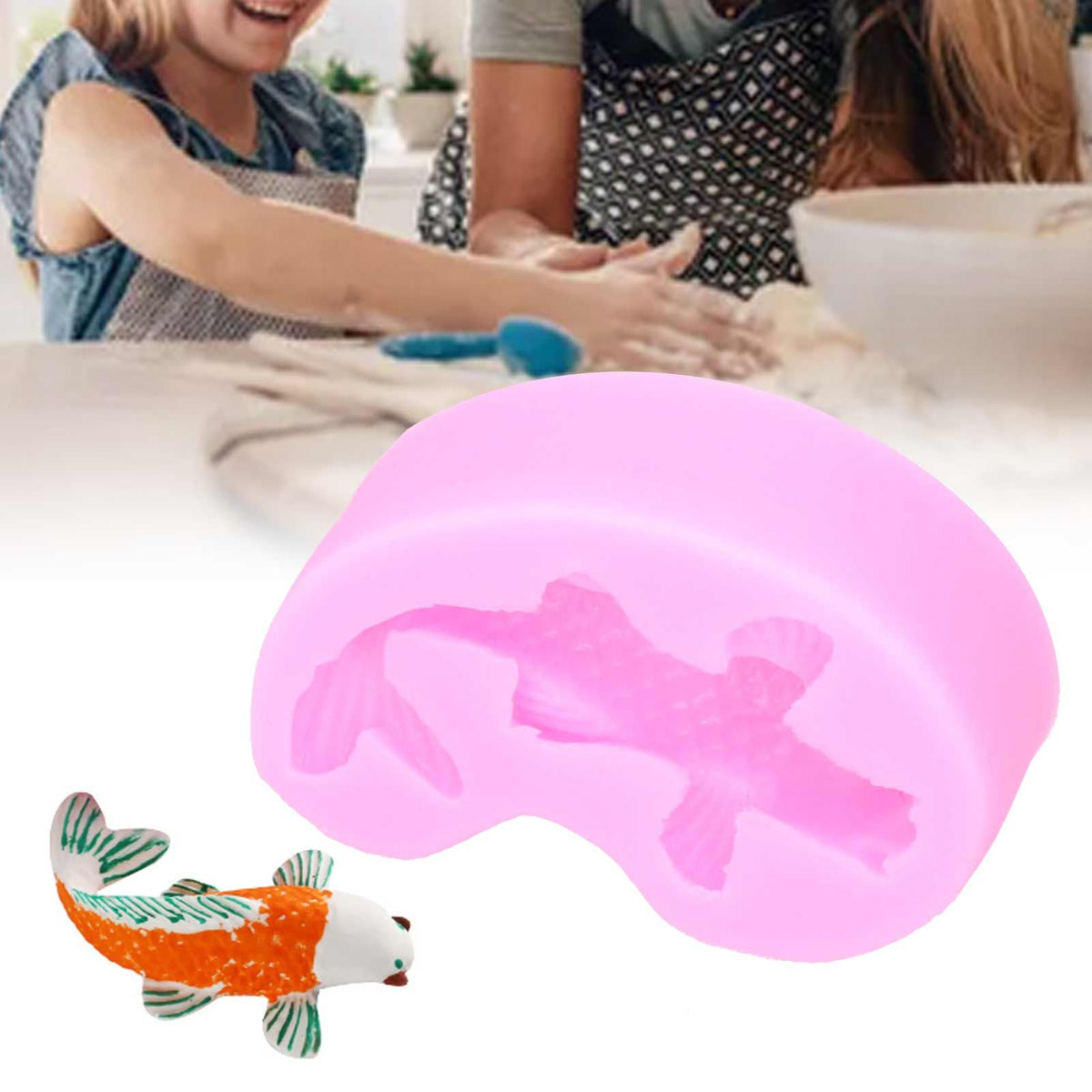 Pink goldfish shape silicone mold for fondant, cake, and chocolate decorations, perfect for DIY baby and kids cake decorating projects.