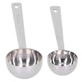 Two stainless steel measuring spoons with long handles, ideal for measuring milk powder, designed for baby and kid's outdoor toys.