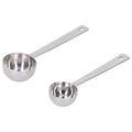 Two stainless steel measuring spoons with long handles, ideal for measuring milk powder, from Everything Baby.