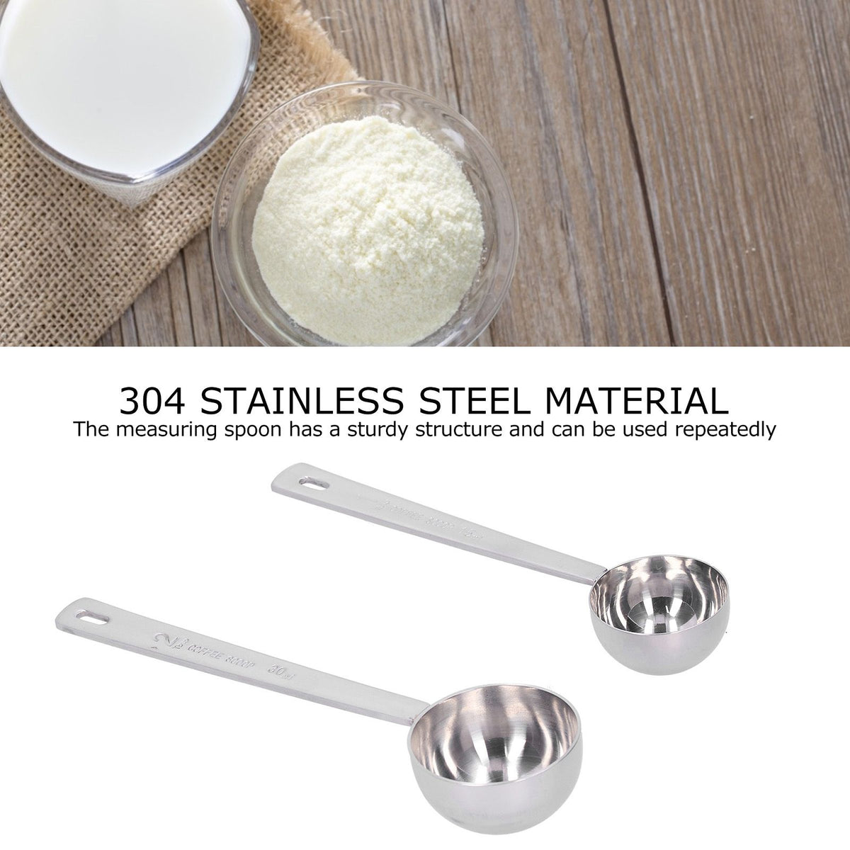 Two stainless steel measuring spoons with long handles, ideal for measuring milk powder for babies, by Everything Baby.