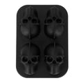 Silicone skull-shaped ice mold for making irregular ice cubes, ideal for home bars and summer parties.