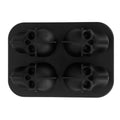 Silicone skull-shaped ice mold tray with irregular cubes, ideal for home bar, parties, and summer drinks.