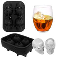 Silicone skull-shaped ice mold tray for making irregular ice cubes, ideal for home bar and summer parties.