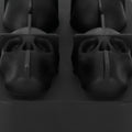 Silicone skull-shaped ice mold tray with irregular ice cubes, ideal for home bar, parties, and summer beverages.