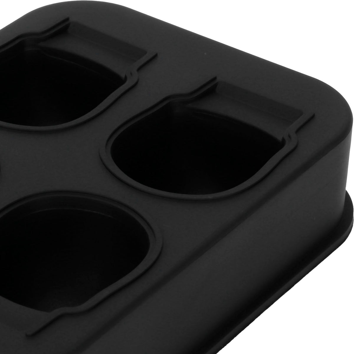 Silicone skull-shaped ice mold for making irregular ice cubes, ideal for home bars and summer parties.