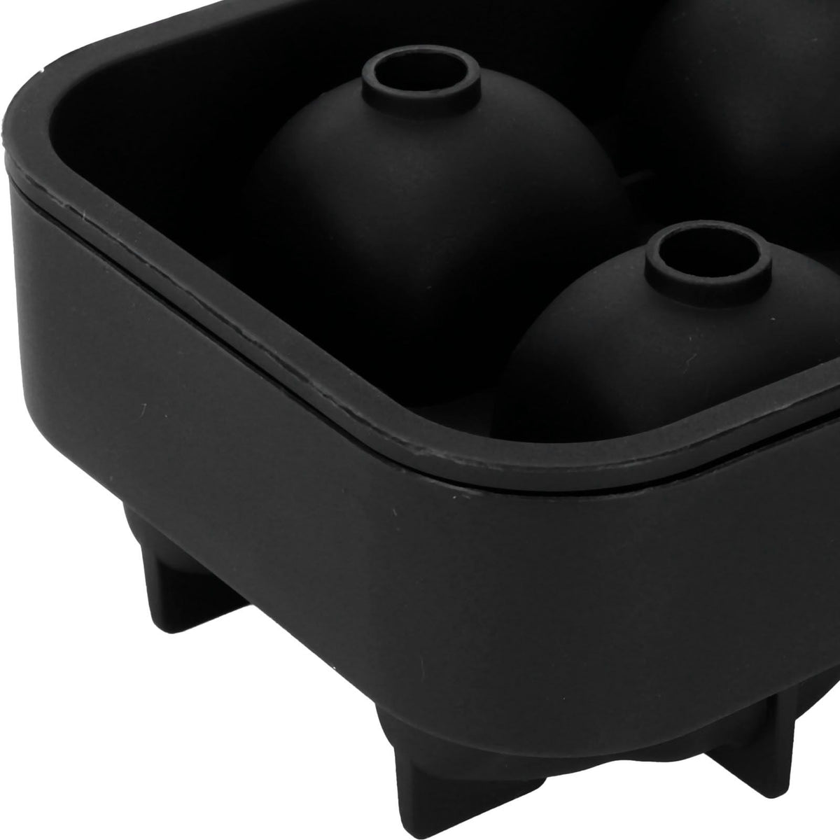 Silicone skull-shaped ice mold tray for creating irregular ice cubes, ideal for home bar and summer parties.