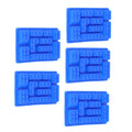 Blue silicone ice tray mold with 5 block-shaped cavities for baking, chocolate, and DIY cake decorating in a home bakery setting.