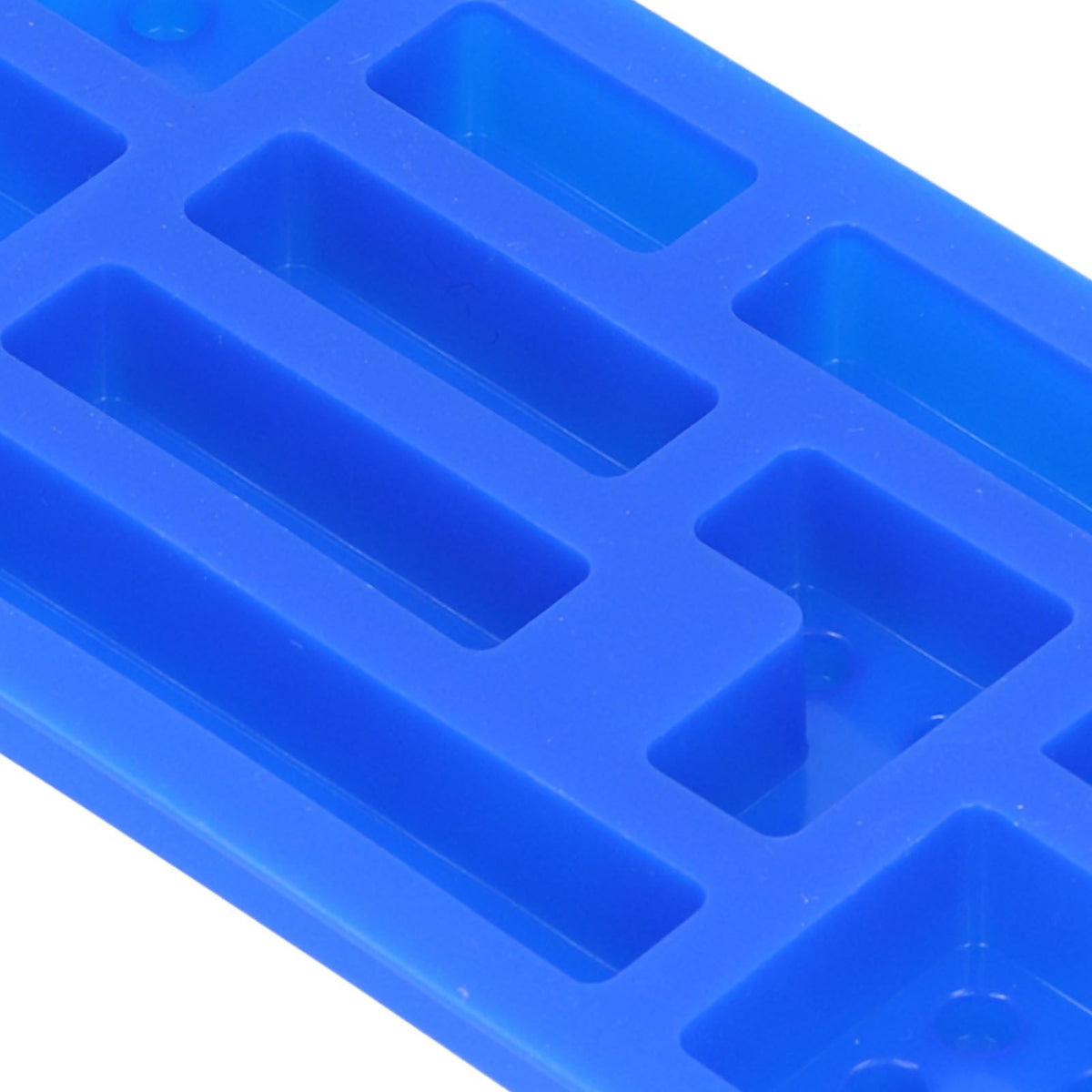 Blue silicone ice tray mold for making block-shaped ice, chocolate, or cake for baking and DIY projects in home kitchens.